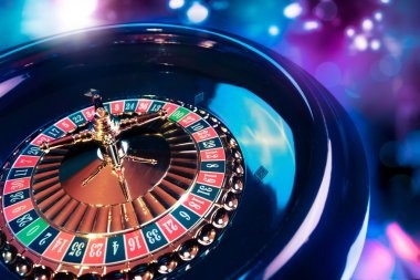 Live roulette wheel with betting layout and game information display on planet128 login platform